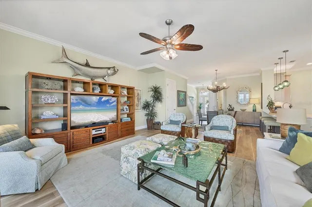 a kitchen with refrigerator cabinets and wooden floor