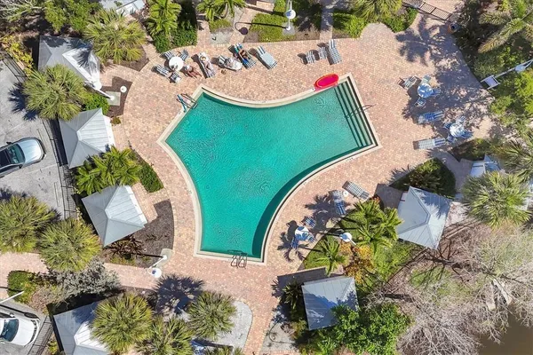 a picture of a bench in front of a wall