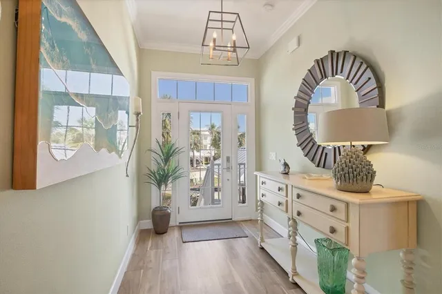 a living room with furniture ceiling fan and a flat screen tv