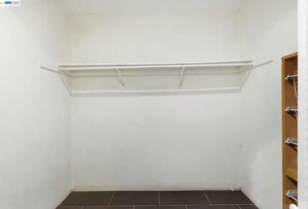 a view of small space with racks on the wall