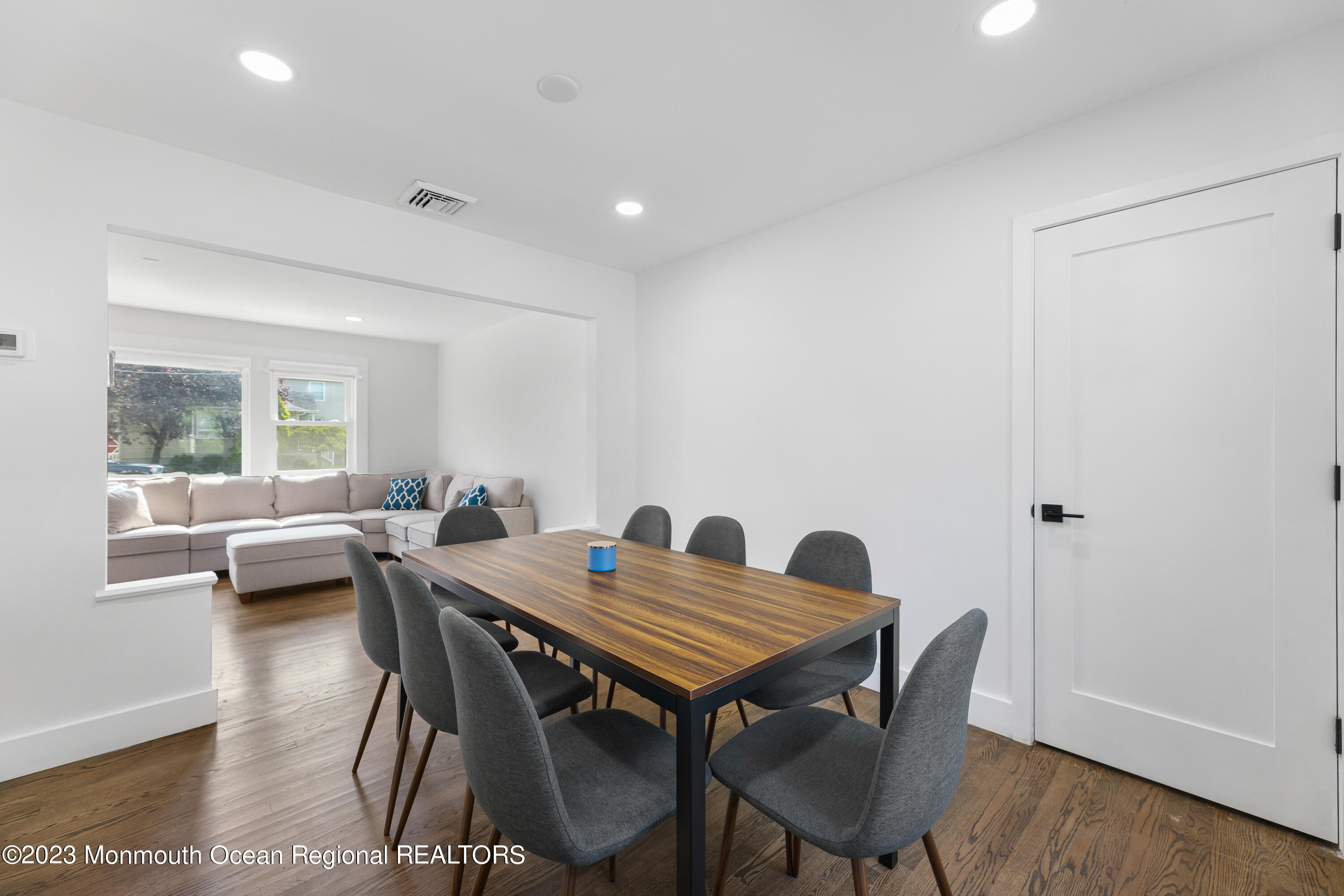 186 Delaware Avenue, Unit WINTER Oakhurst, NJ 07755 - Photo 18 of 31 a view of a dining room with furniture and wooden floor