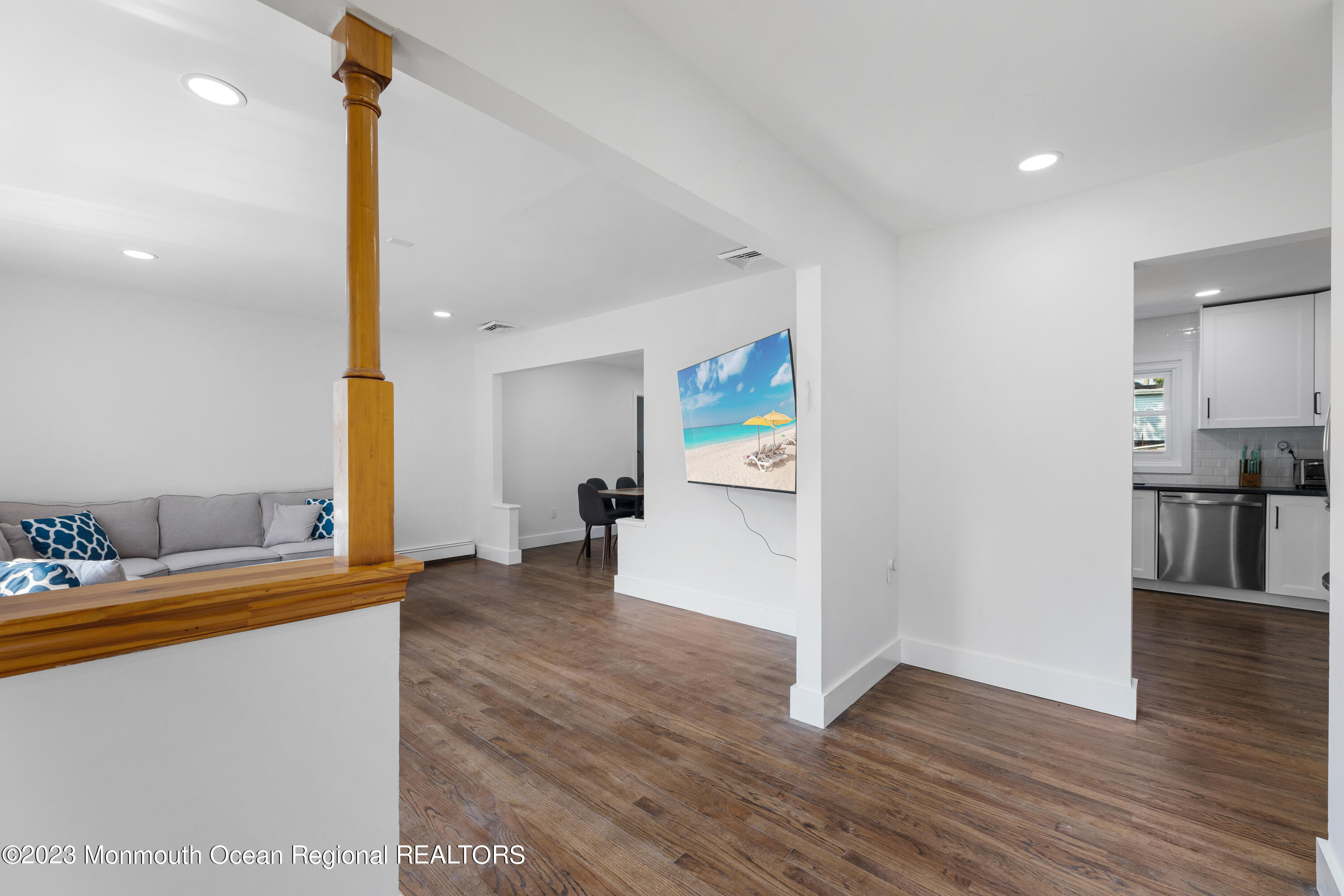 186 Delaware Avenue, Unit WINTER Oakhurst, NJ 07755 - Photo 23 of 31 a view of kitchen with furniture and wooden floor