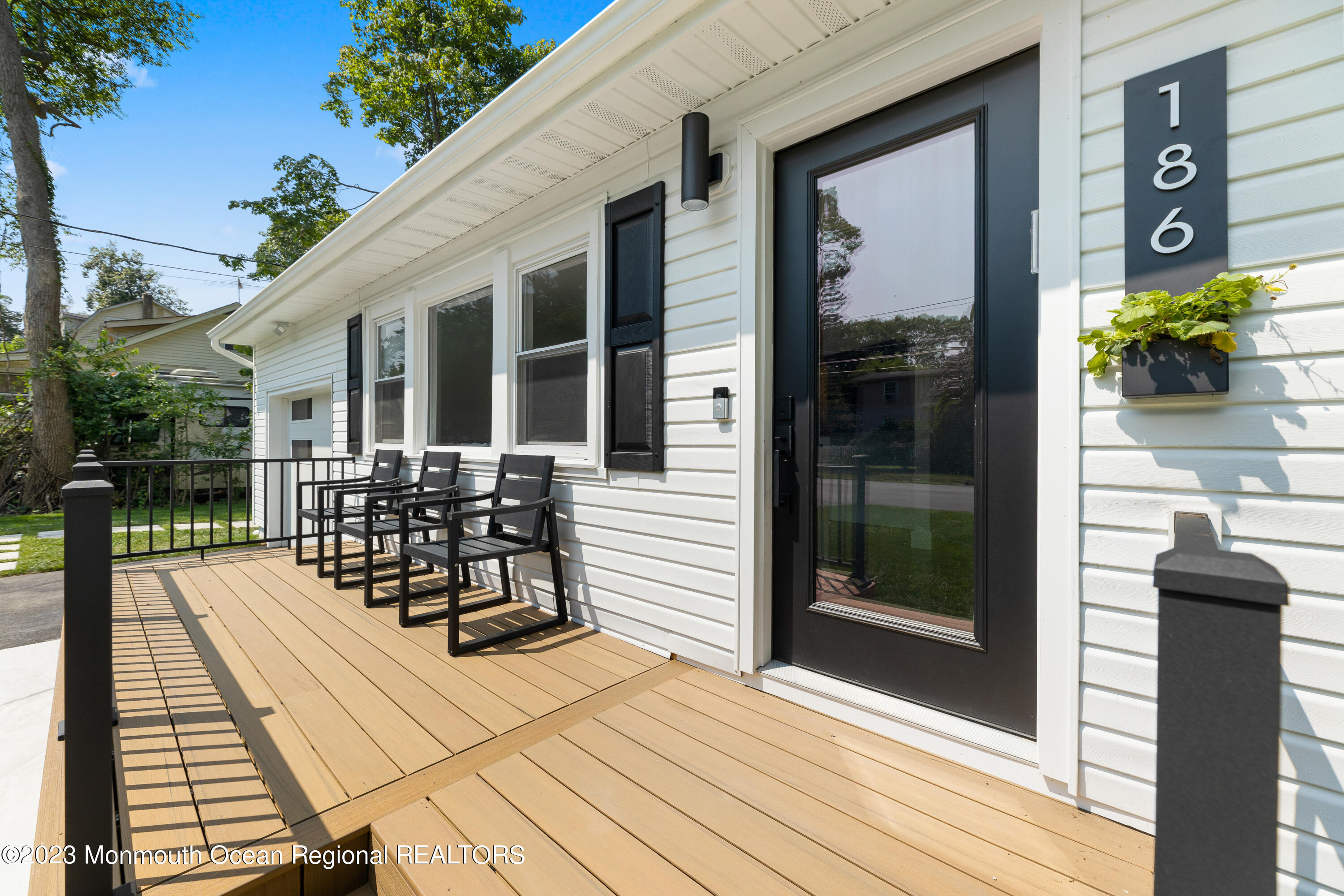 186 Delaware Avenue, Unit WINTER Oakhurst, NJ 07755 - Photo 4 of 31 a view of outdoor seating space