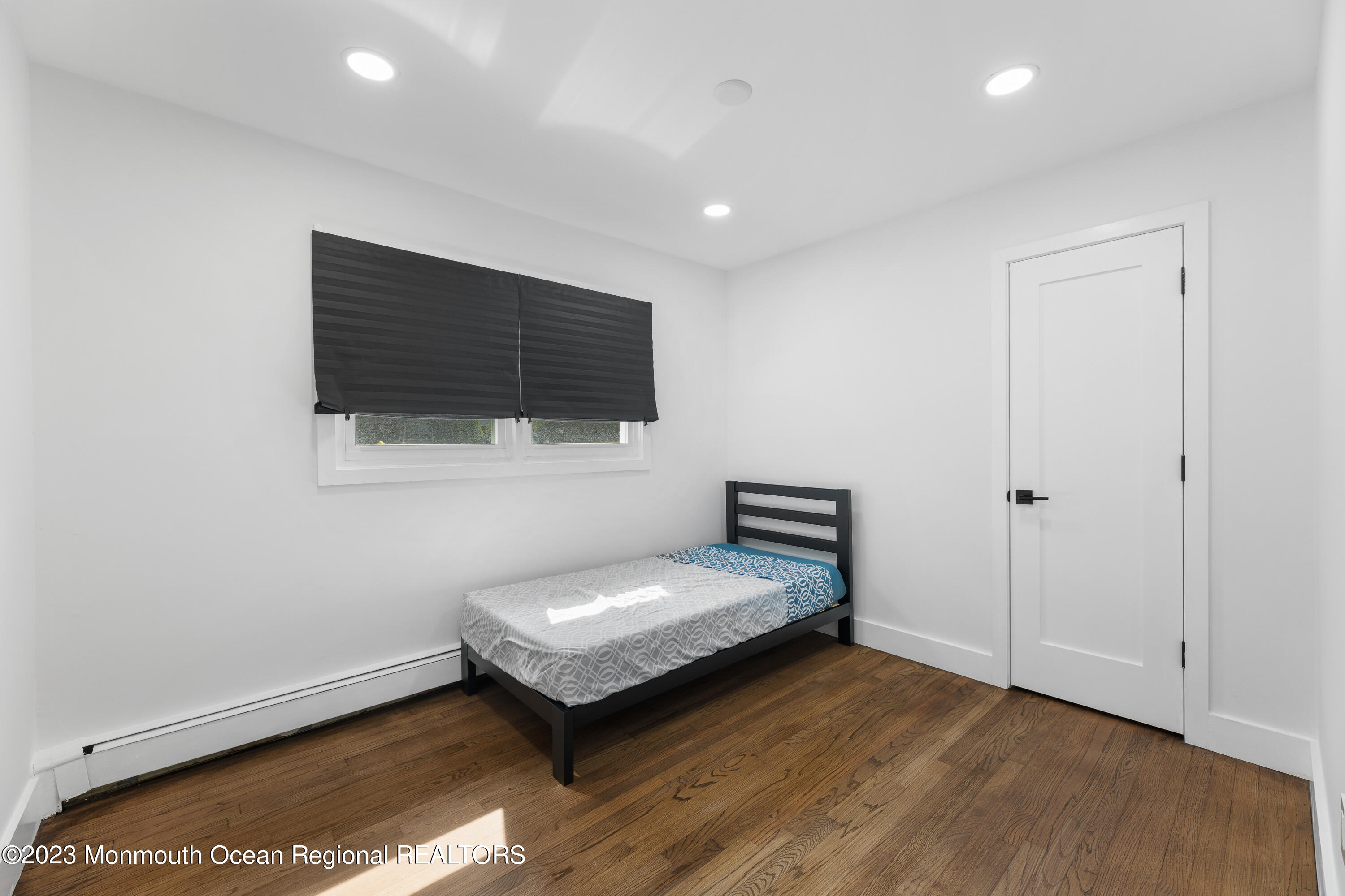 186 Delaware Avenue, Unit WINTER Oakhurst, NJ 07755 - Photo 10 of 31 a living room with furniture and a flat screen tv