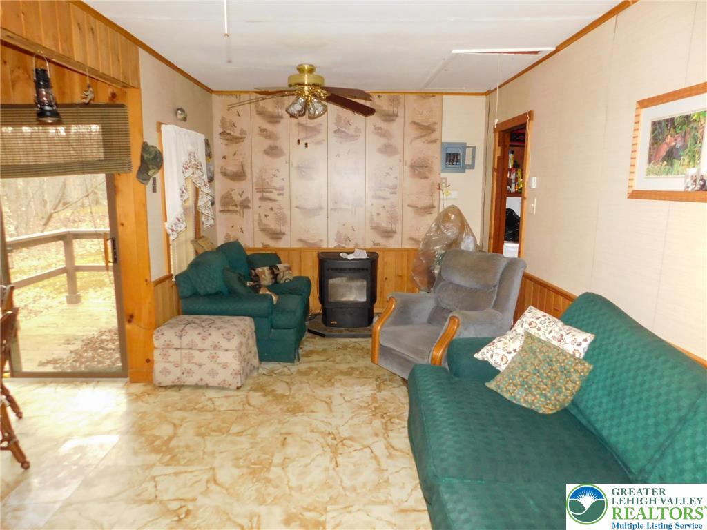 156 Pine Flats Colony Road Dingmans Ferry, PA 18328 - Photo 2 of 16 a living room with furniture