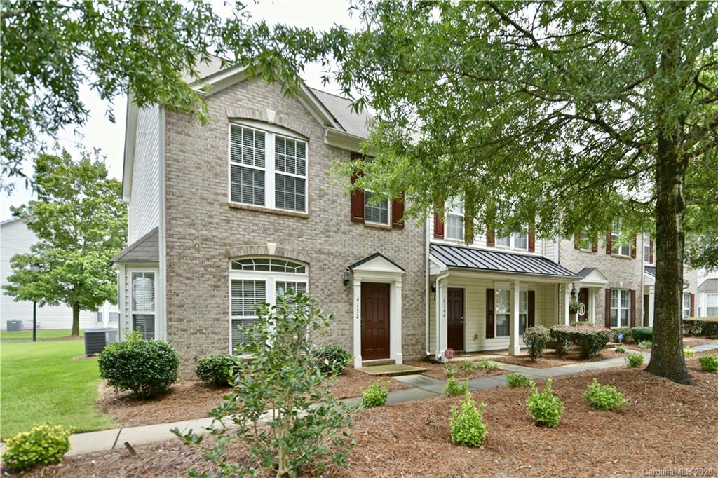 6152 Prosperity Church Road Charlotte, NC 28269 - Photo 1 of 33 front view of a house with a yard