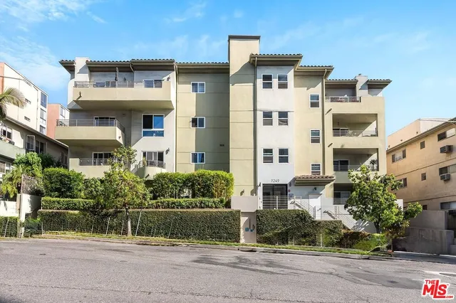 front view of a house with a small yard
