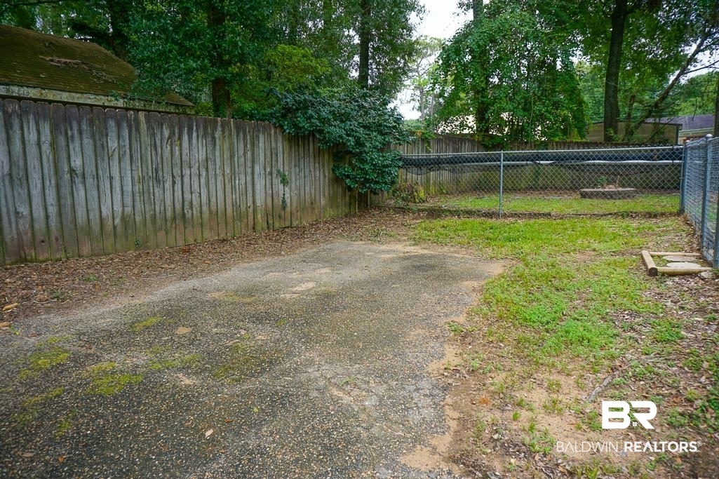 254 Thrift Street Mobile, AL 36609 - Photo 15 of 16 View of fenced backyard