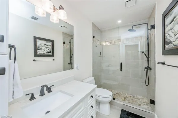 a view of a field with trees