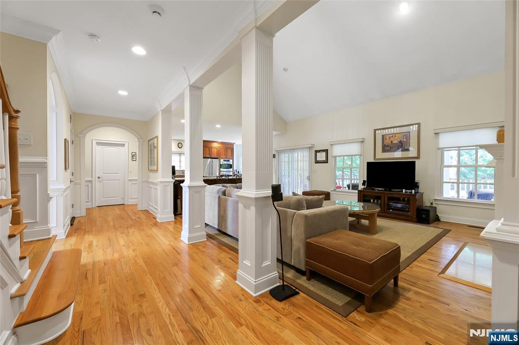 22 Meadowlake Drive Mahwah, NJ 07430 - Photo 20 of 39 a living room with furniture and a flat screen tv