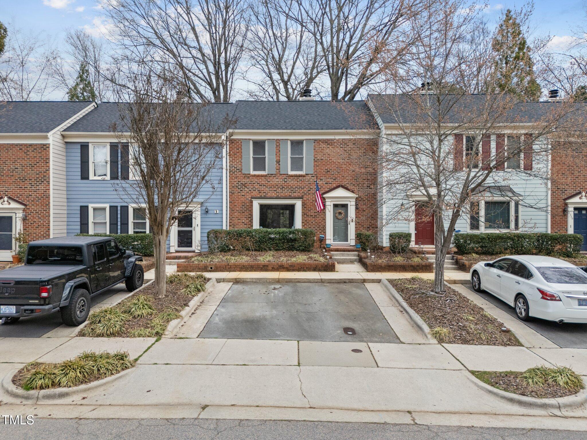 1334 Baez Street Raleigh, NC 27608 - Photo 1 of 28 1-web-or-mls-DJI_20250310142101_0602_D
