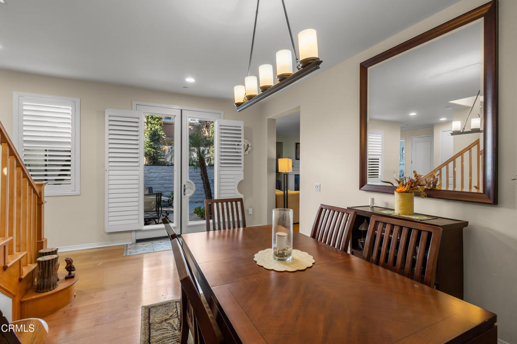 1365 Donegal Way Oxnard, CA 93035 - Photo 14 of 34 a view of a dining room with furniture and a chandelier