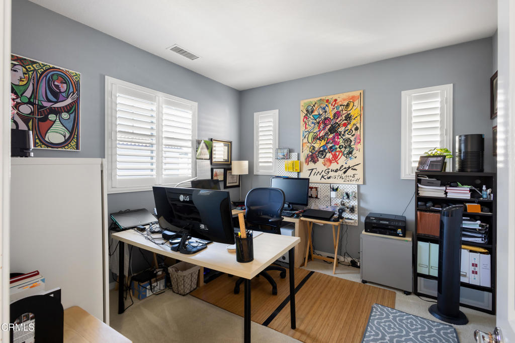 1365 Donegal Way Oxnard, CA 93035 - Photo 24 of 34 a view of a workspace with furniture and a window