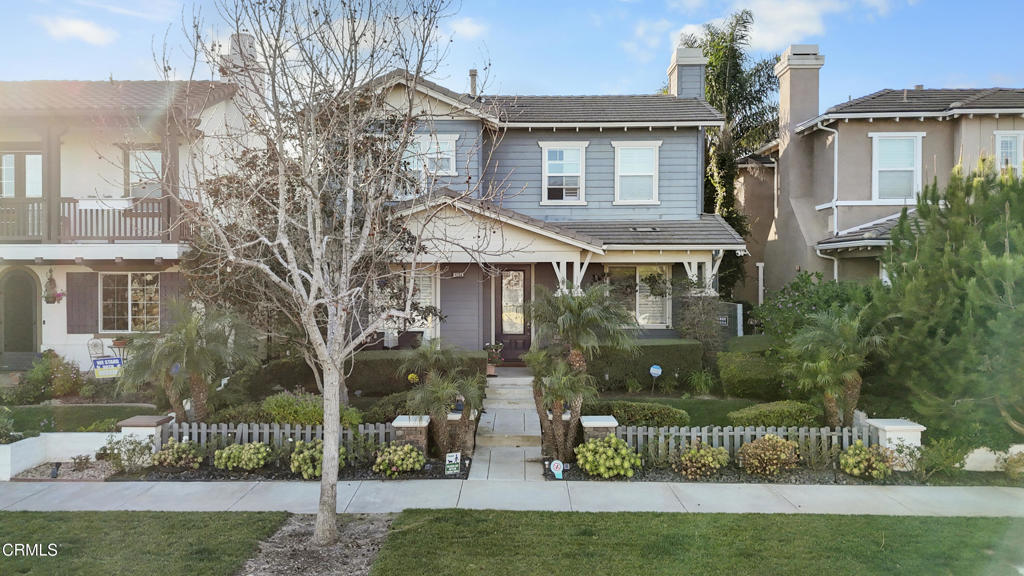 1365 Donegal Way Oxnard, CA 93035 - Photo 3 of 34 a front view of a house with a garden