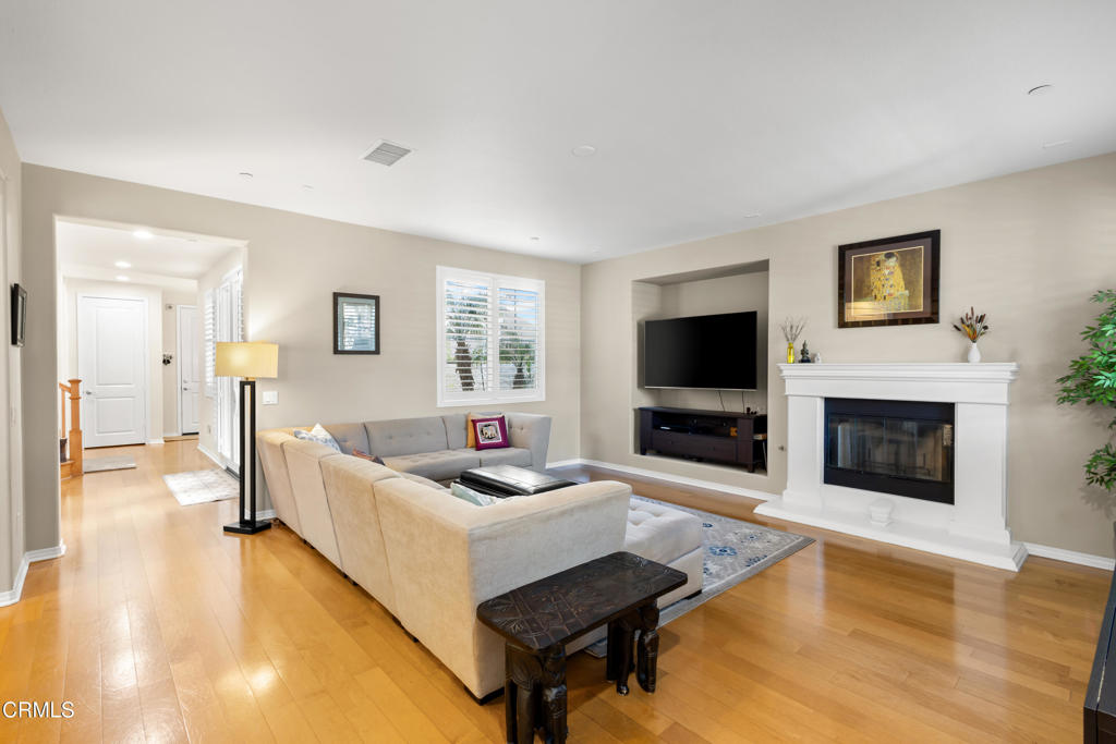 1365 Donegal Way Oxnard, CA 93035 - Photo 5 of 34 a living room with furniture and a flat screen tv