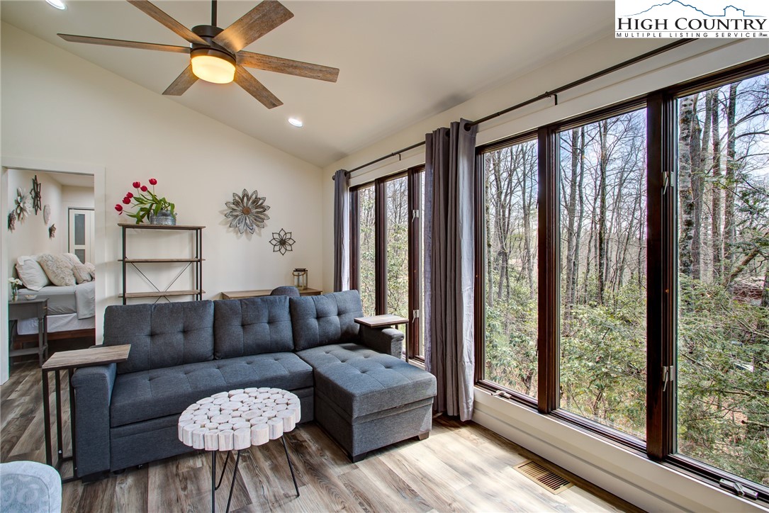 216 Ivy Road Newland, NC 28657 - Photo 5 of 26 a living room with furniture and a large window