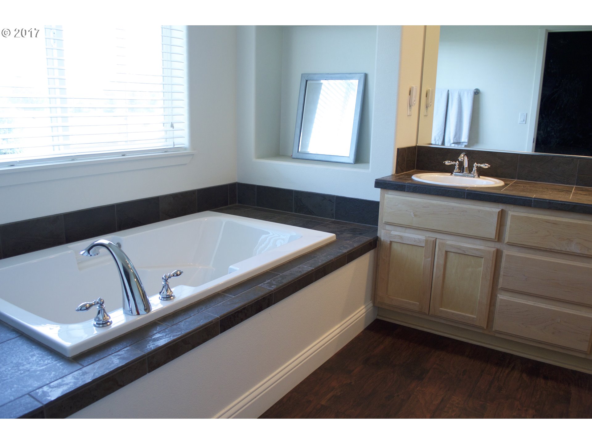 2773 North Fremont Street Cornelius, OR 97113 - Photo 13 of 24 a bathroom with a sink and a mirror