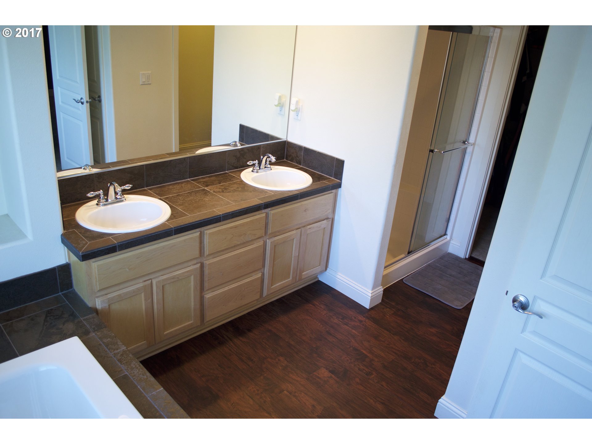 2773 North Fremont Street Cornelius, OR 97113 - Photo 14 of 24 a bathroom with a sink and a mirror