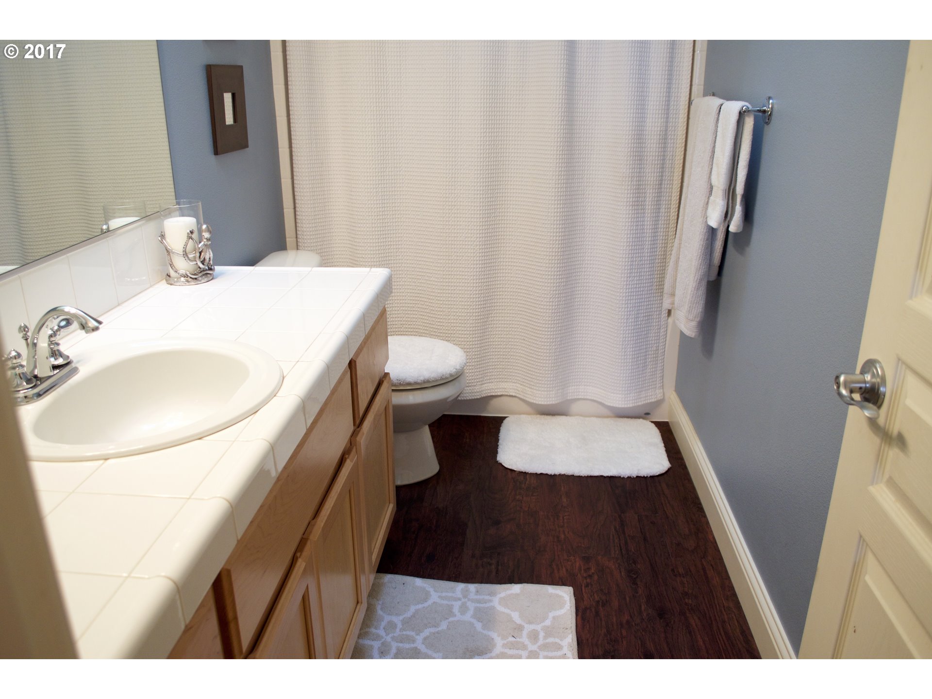 2773 North Fremont Street Cornelius, OR 97113 - Photo 17 of 24 a bathroom with a sink a toilet and a mirror