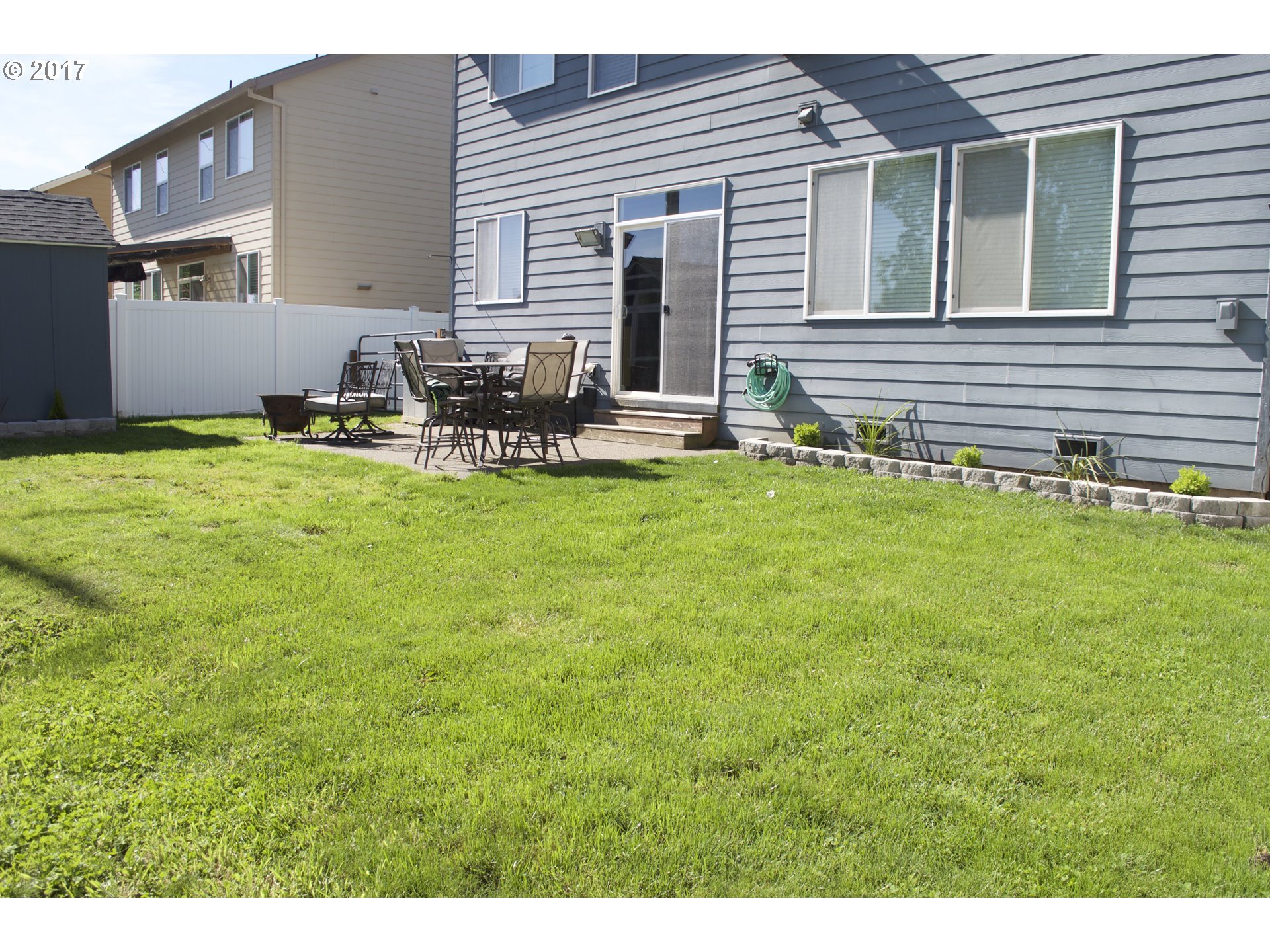 2773 North Fremont Street Cornelius, OR 97113 - Photo 20 of 24 a view of a house with patio and a yard