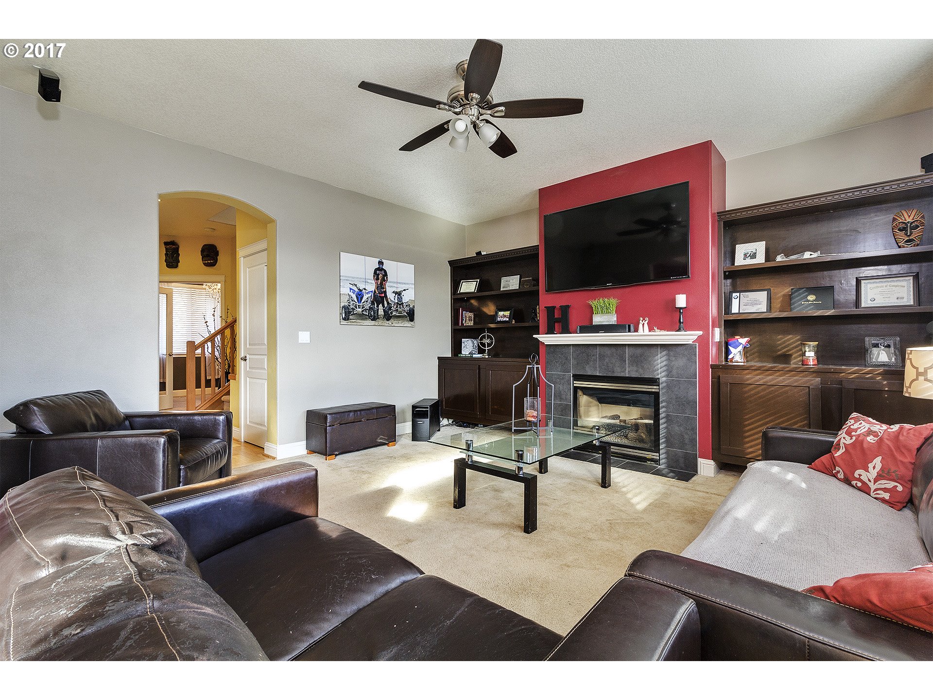 2773 North Fremont Street Cornelius, OR 97113 - Photo 6 of 24 a living room with furniture a flat screen tv and a fireplace