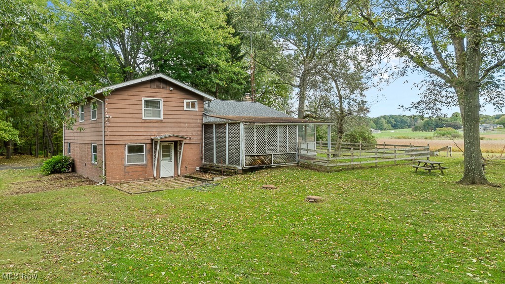 3166 Work Road Ravenna, OH 44266 - Photo 43 of 48 Rear view of house with a yard