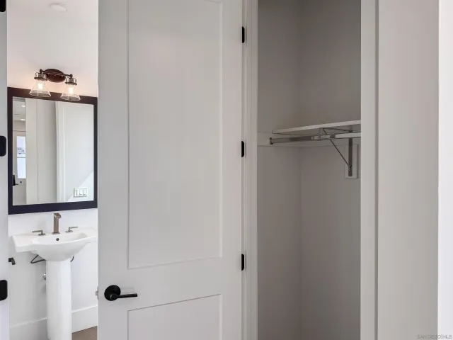 a bathroom with a sink and mirror