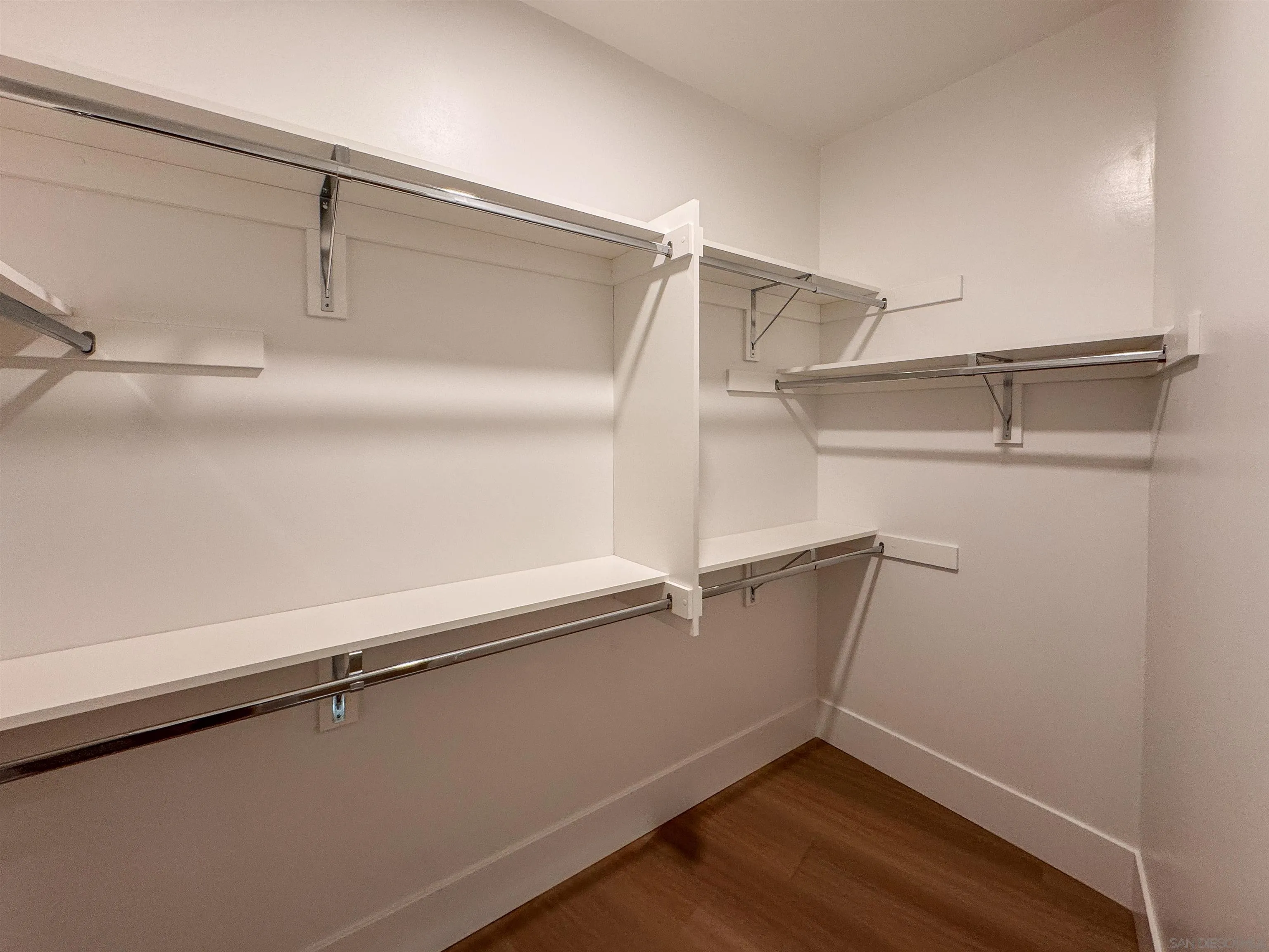 7290 Ponto Drive North, Unit 7302 Carlsbad, CA 92011 - Photo 21 of 55 a view of a room with racks on the wall