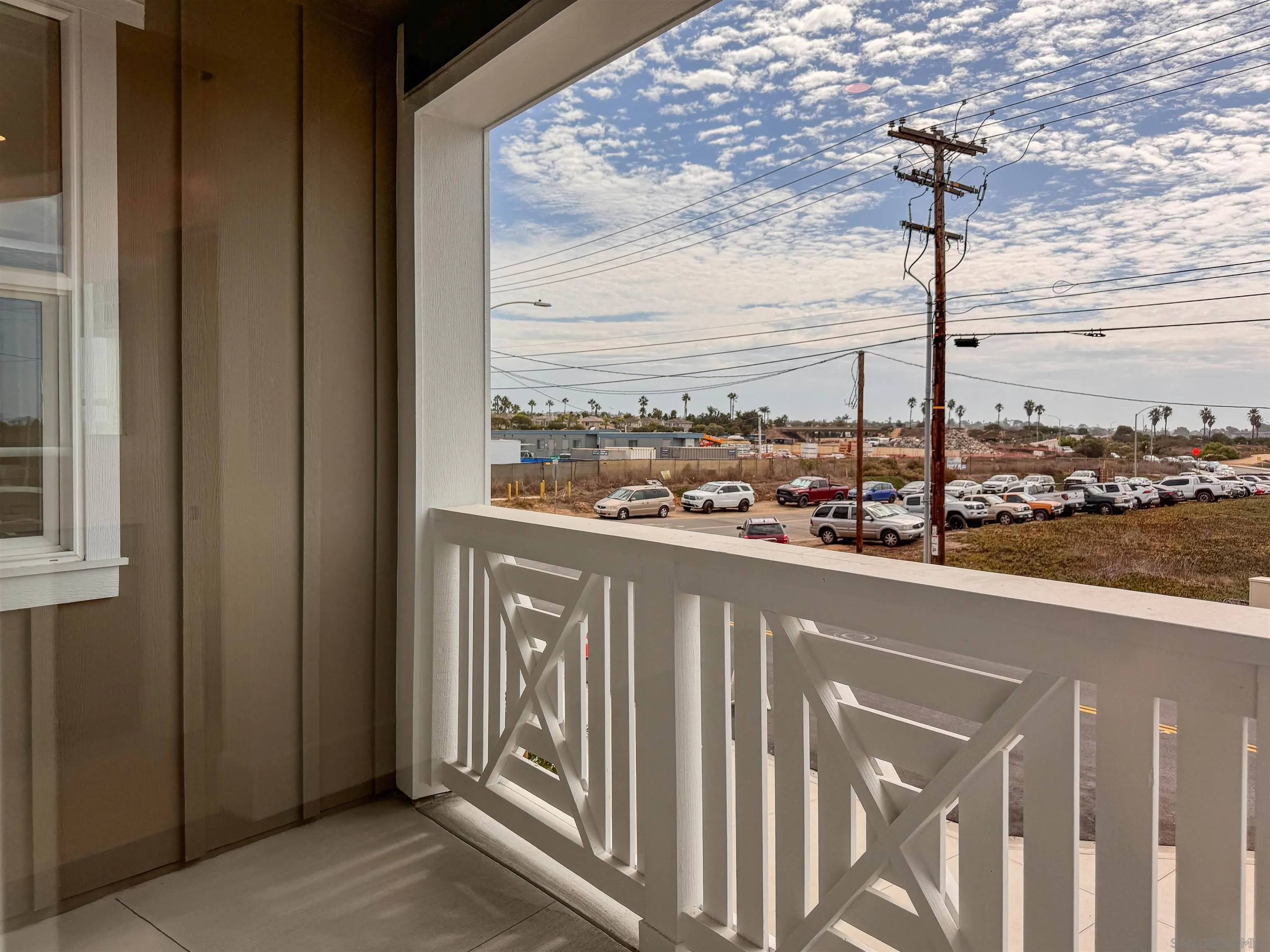 7290 Ponto Drive North, Unit 7302 Carlsbad, CA 92011 - Photo 23 of 55 a balcony with street view