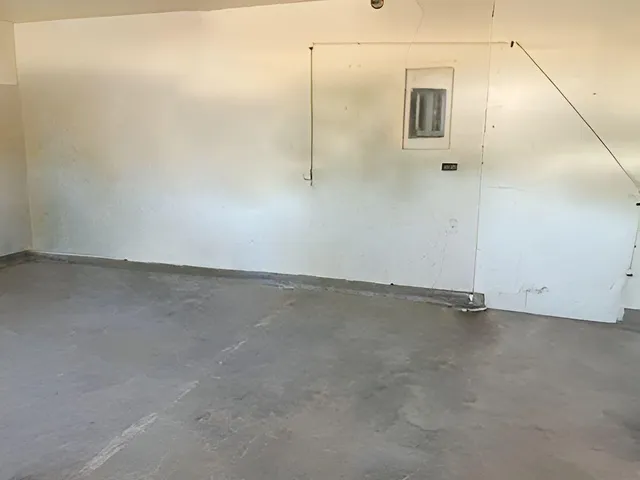 a view of a room with rack on the wall