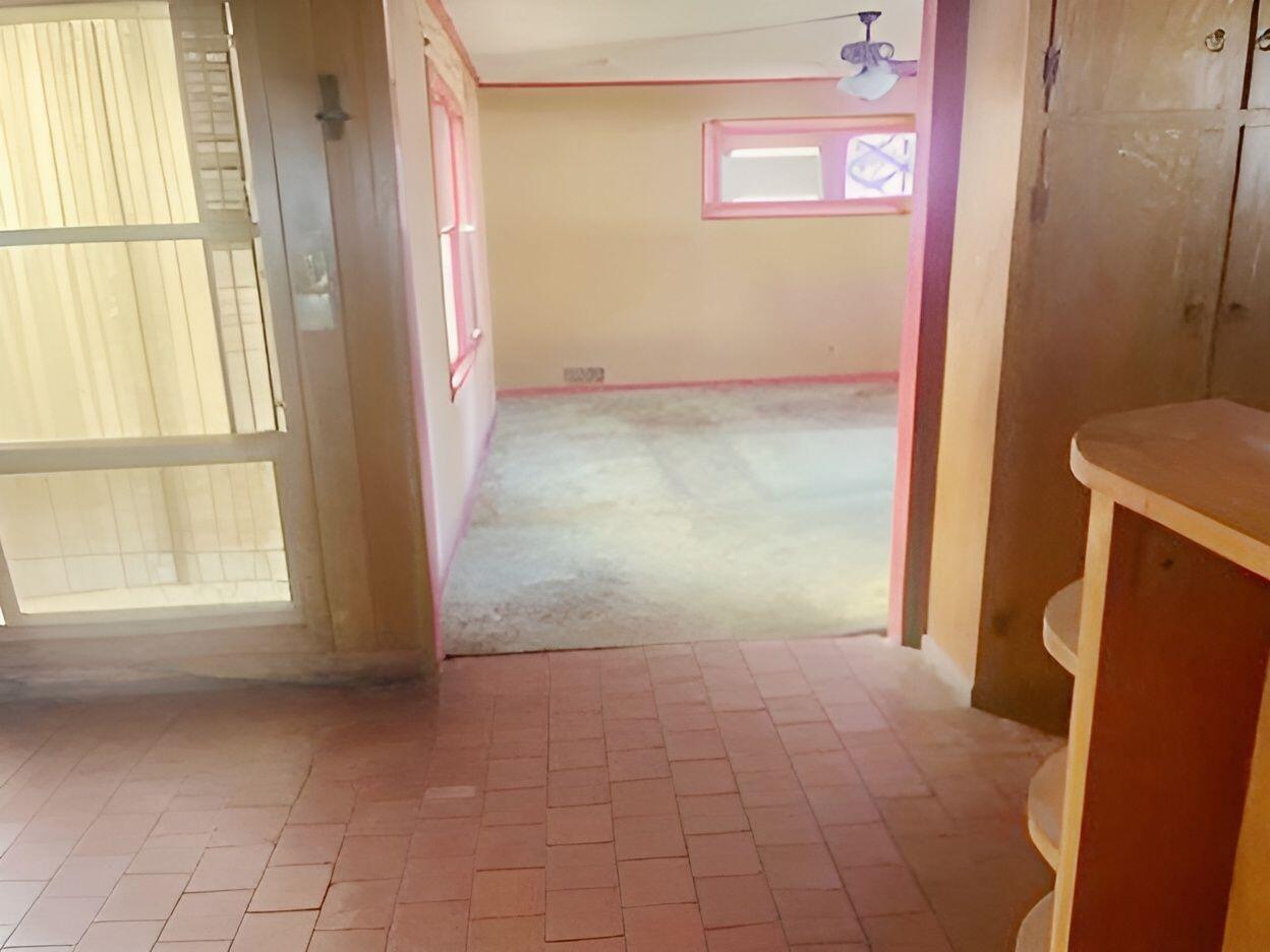 1006 Borger Plainview, TX 79072 - Photo 10 of 15 a view of an empty room with a window