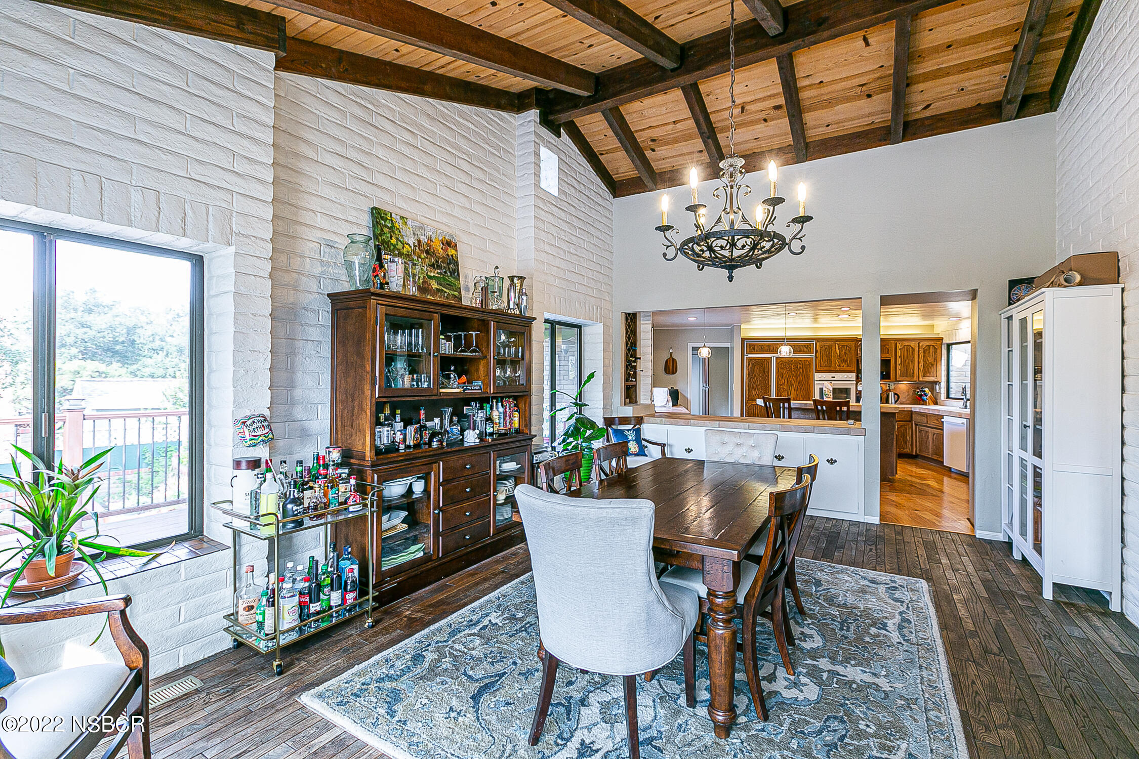 400 Oak Hill Drive Lompoc, CA 93436 - Photo 25 of 56 a dining room with furniture wooden floor and a potted plant