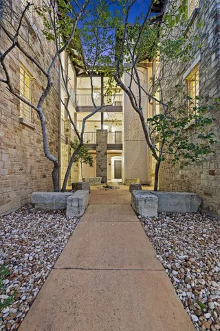 a house with trees in front of it