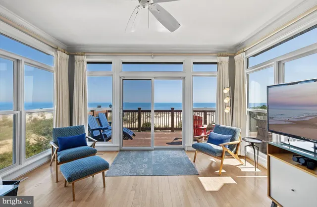 a view of a balcony with wooden floor