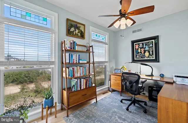 a kitchen with stainless steel appliances granite countertop a sink and a stove