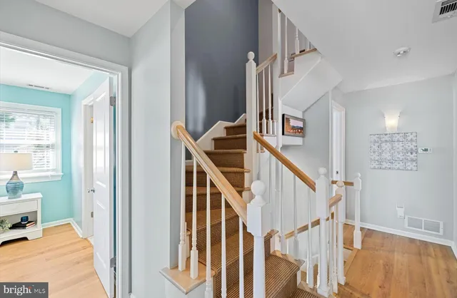 a view of a livingroom with furniture and windows