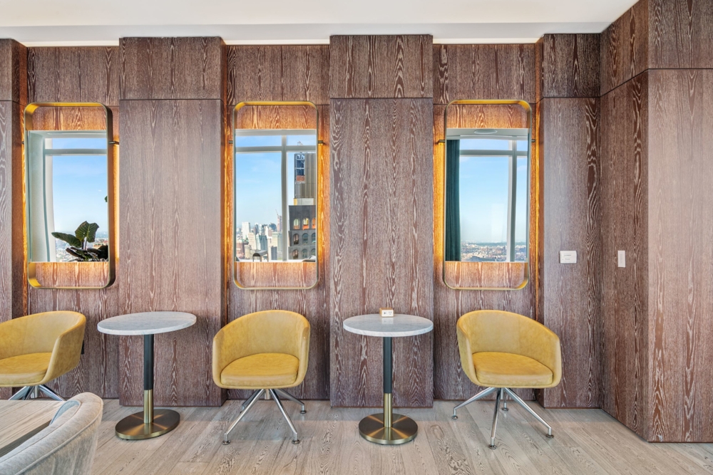 19 Dutch Street, Unit 33D Manhattan, NY 10038 - Photo 14 of 23 a view of a livingroom with furniture and a chair