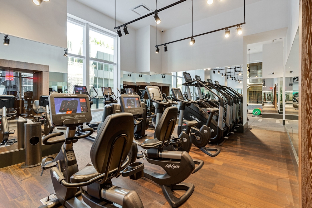 19 Dutch Street, Unit 33D Manhattan, NY 10038 - Photo 17 of 23 a view of a room with gym equipment
