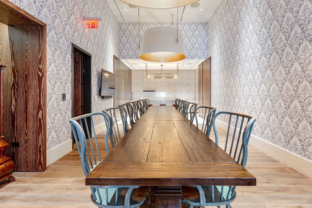 19 Dutch Street, Unit 33D Manhattan, NY 10038 - Photo 20 of 23 a dining room with furniture and wooden floor