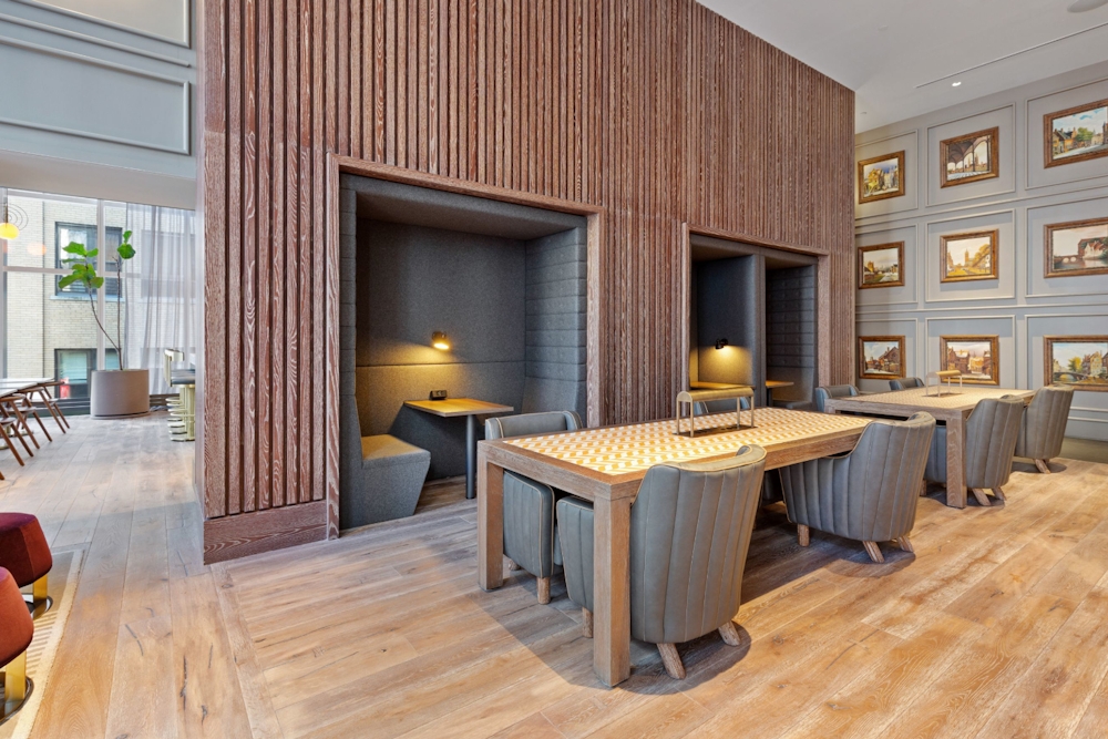 19 Dutch Street, Unit 33D Manhattan, NY 10038 - Photo 7 of 23 a kitchen that has a table and chairs in it