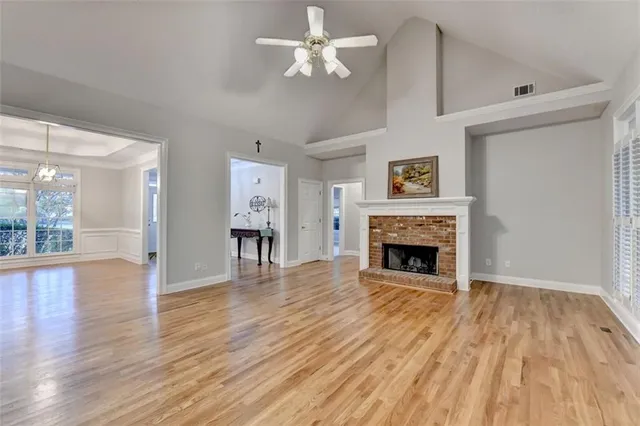 a kitchen with stainless steel appliances granite countertop a stove and a microwave