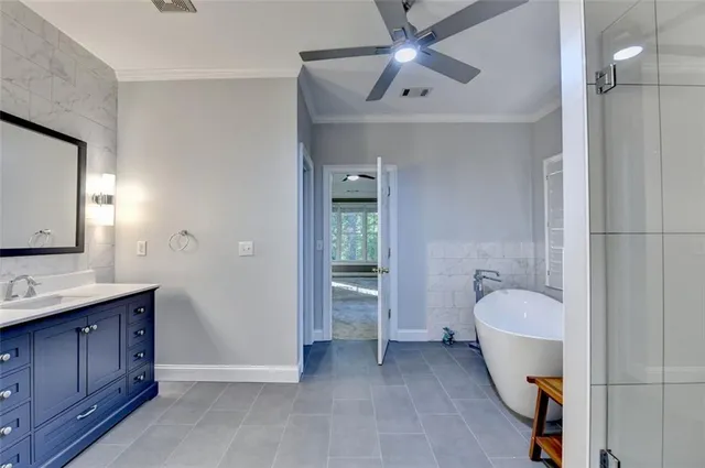 a view of an empty room with a chandelier