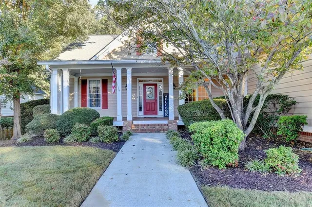 front view of a house with a yard