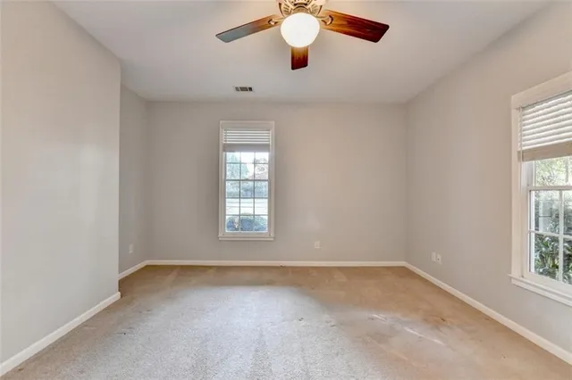a view of a room with wooden floor and balcony