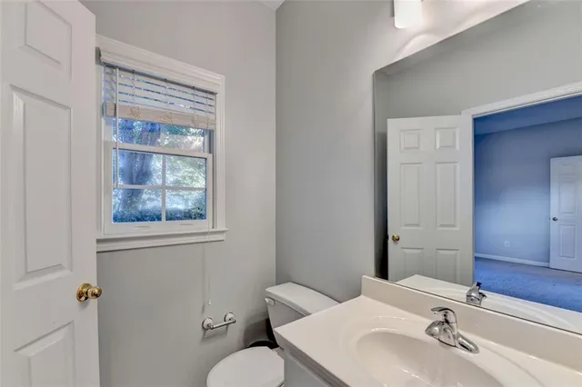 a view of balcony with wooden floor and fence