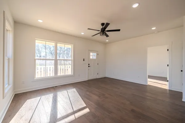 a view of an empty room with a window