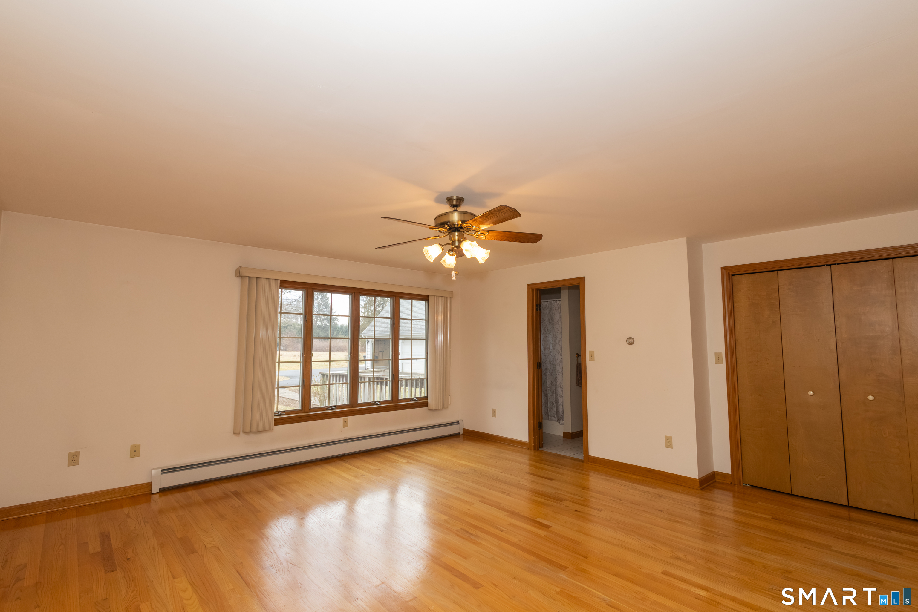 352 Carter Lane Southington, CT 06489 - Photo 24 of 40 wooden floor in an empty room with a window