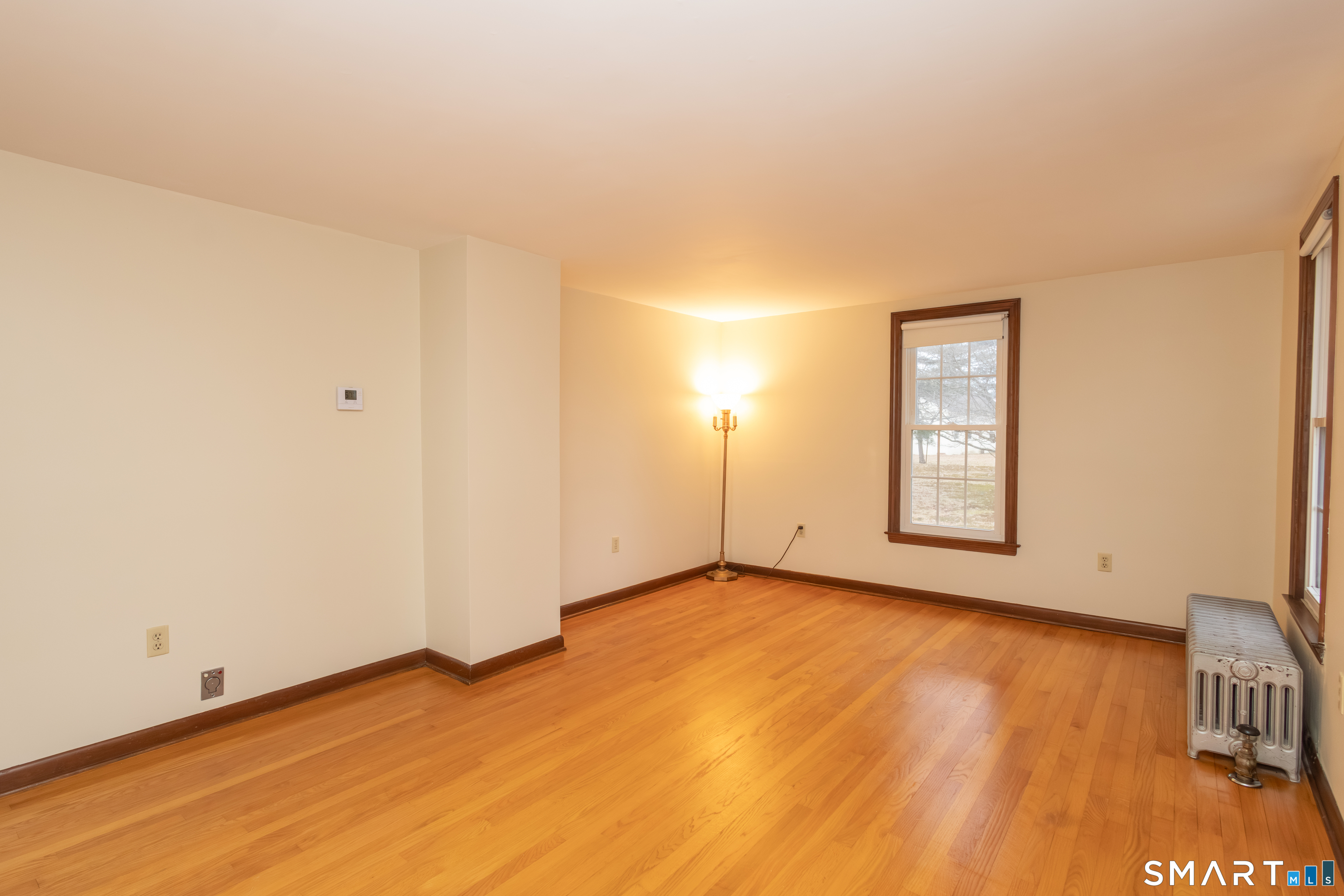 352 Carter Lane Southington, CT 06489 - Photo 28 of 40 an empty room with wooden floor and windows