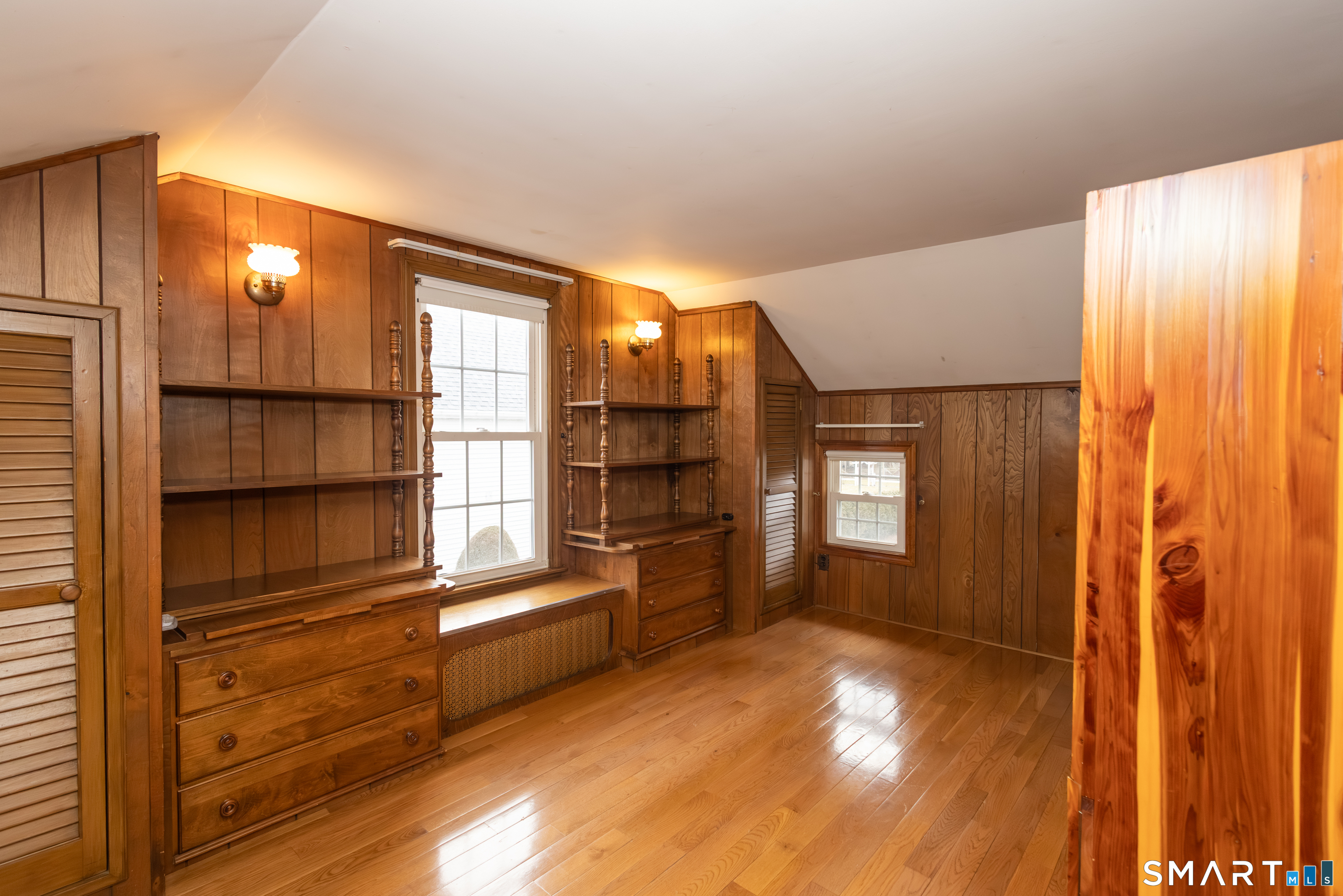 352 Carter Lane Southington, CT 06489 - Photo 34 of 40 a view of empty room with wooden floor and windows