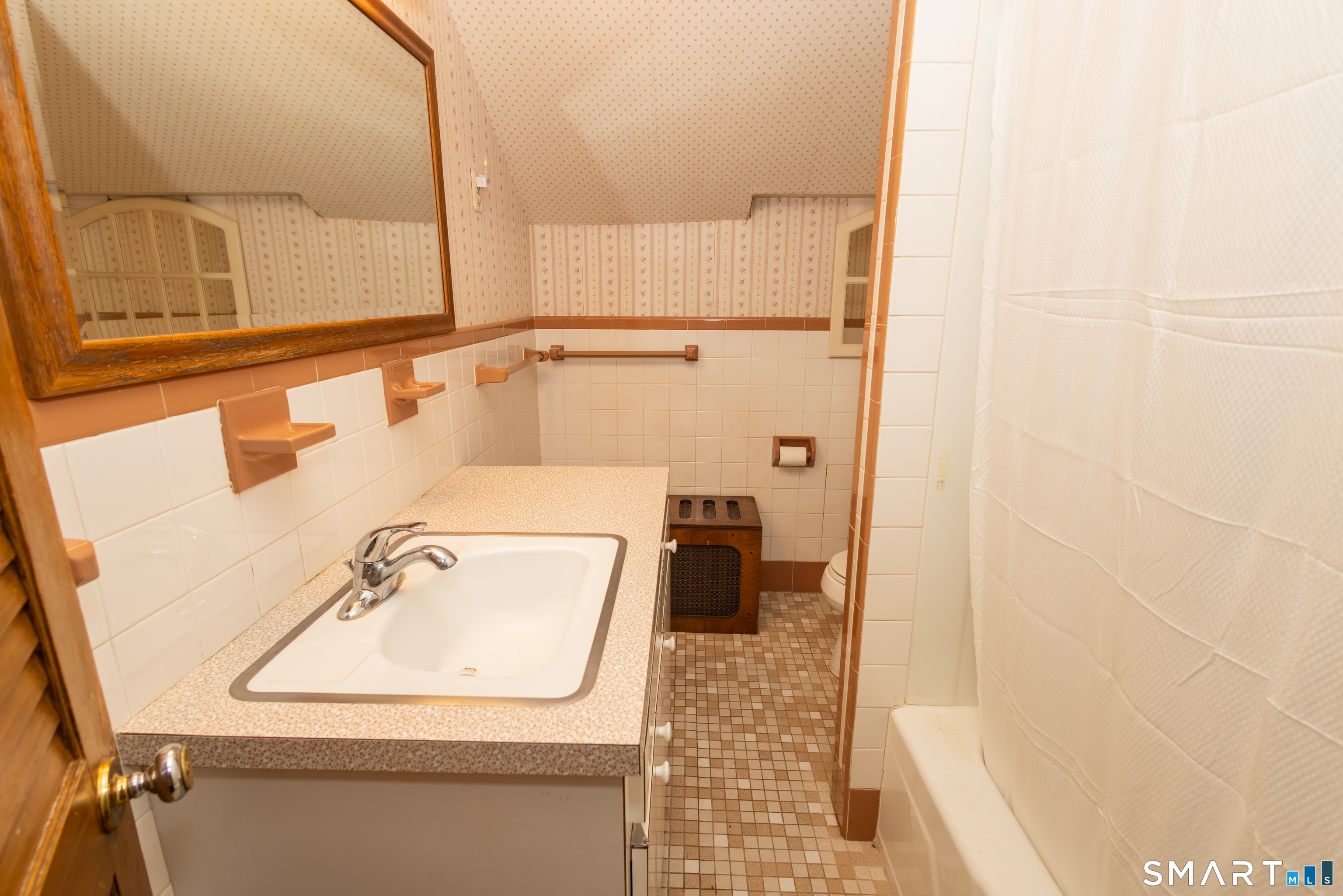 352 Carter Lane Southington, CT 06489 - Photo 35 of 40 view of bathroom with a sink and mirror